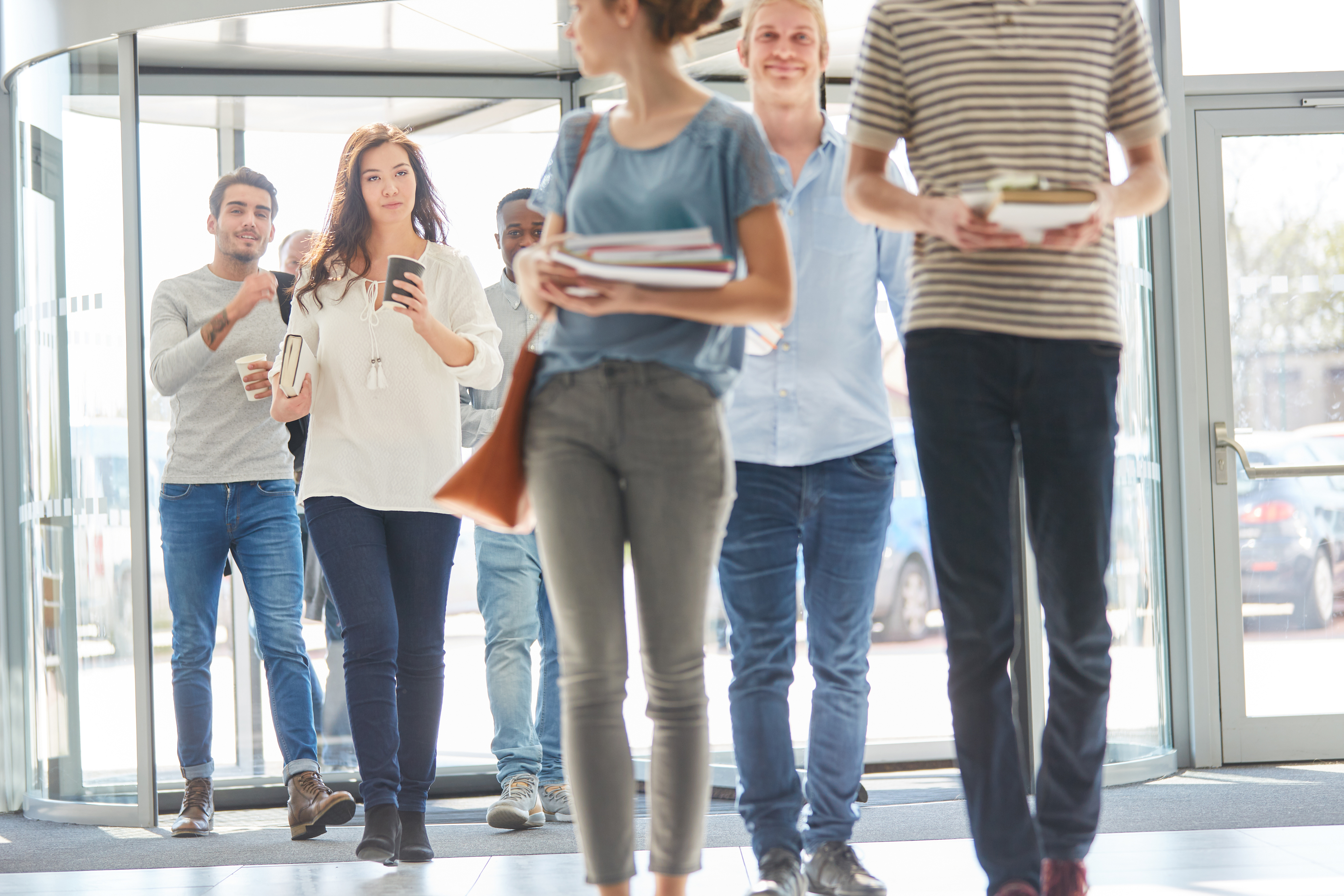 Students entering foyer at University